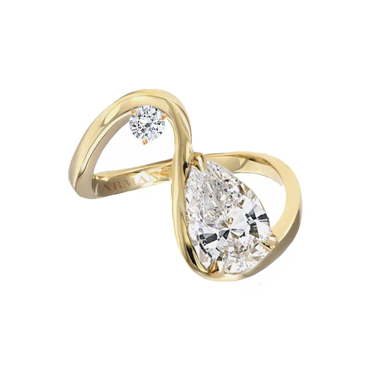 Pear and Round Diamond Twist Ring